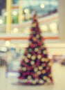 ÃÂ¡hristmas tree in shopping mall, defoused holiday background Royalty Free Stock Photo